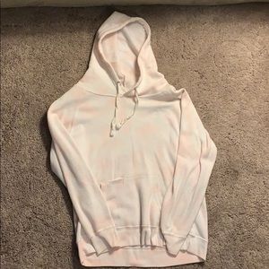 a tie-dye pink & white hoodie